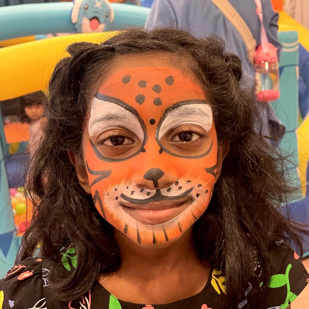 Facepainting for Children's parties by The Kindled Collective - leopard facepainting - animal birthday party themed face painting