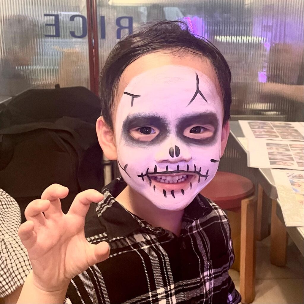 Facepainting for Children's parties by The Kindled Collective - skull design facepainting- halloween themed face painting