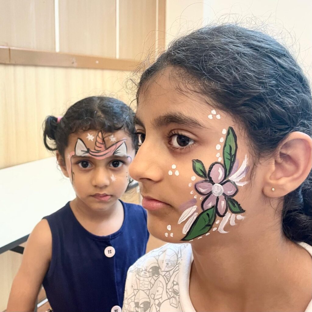 Facepainting for Children's parties by The Kindled Collective - floral design on face, deepavali themed facepainting