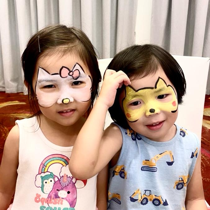 Facepainting for Children's parties by The Kindled Collective - hello kitty and pikachu design - birthday party themed face painting