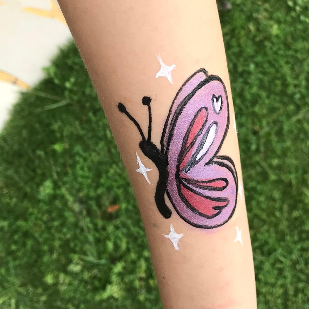 Facepainting for Children's parties by The Kindled Collective - butterfly design on forearm