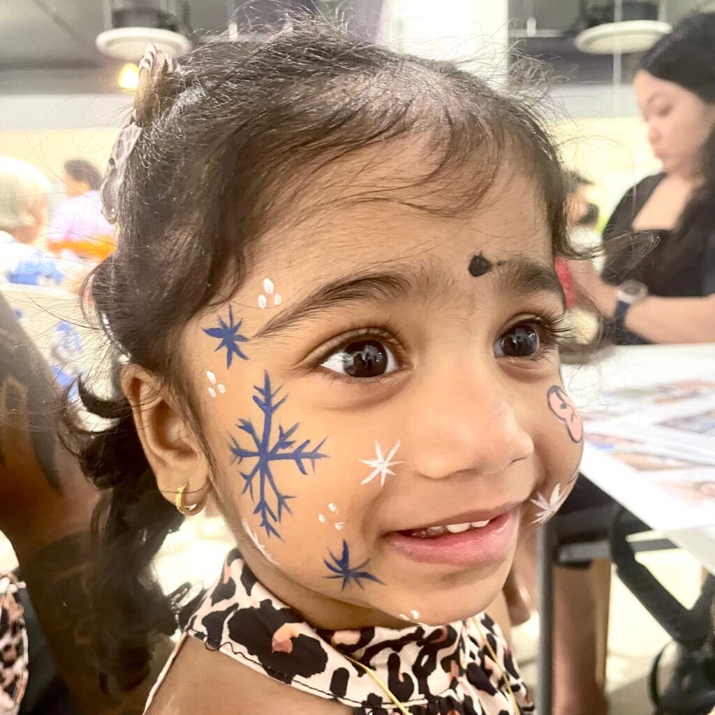 Facepainting for Children's parties by The Kindled Collective - snowflake elsa frozen design on face