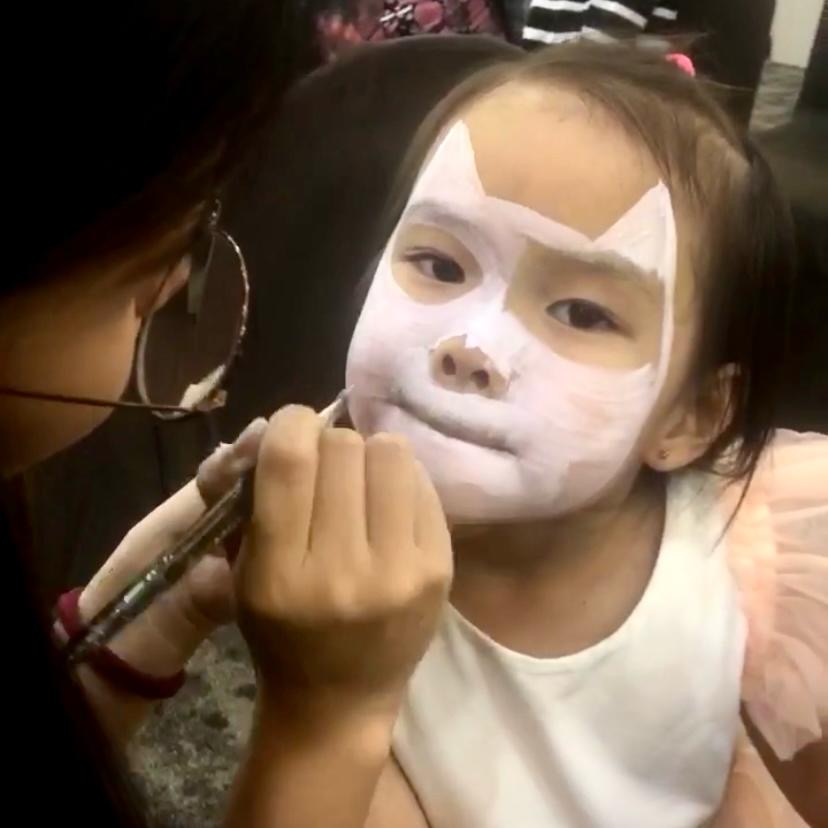 Facepainting for Children's parties by The Kindled Collective - hello kitty design on face