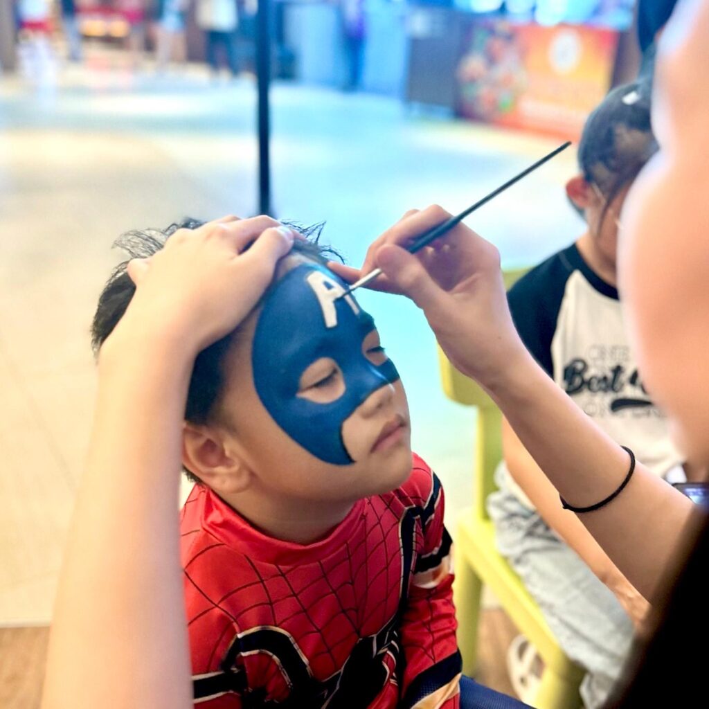 Facepainting for Children's parties by The Kindled Collective - captain america on face