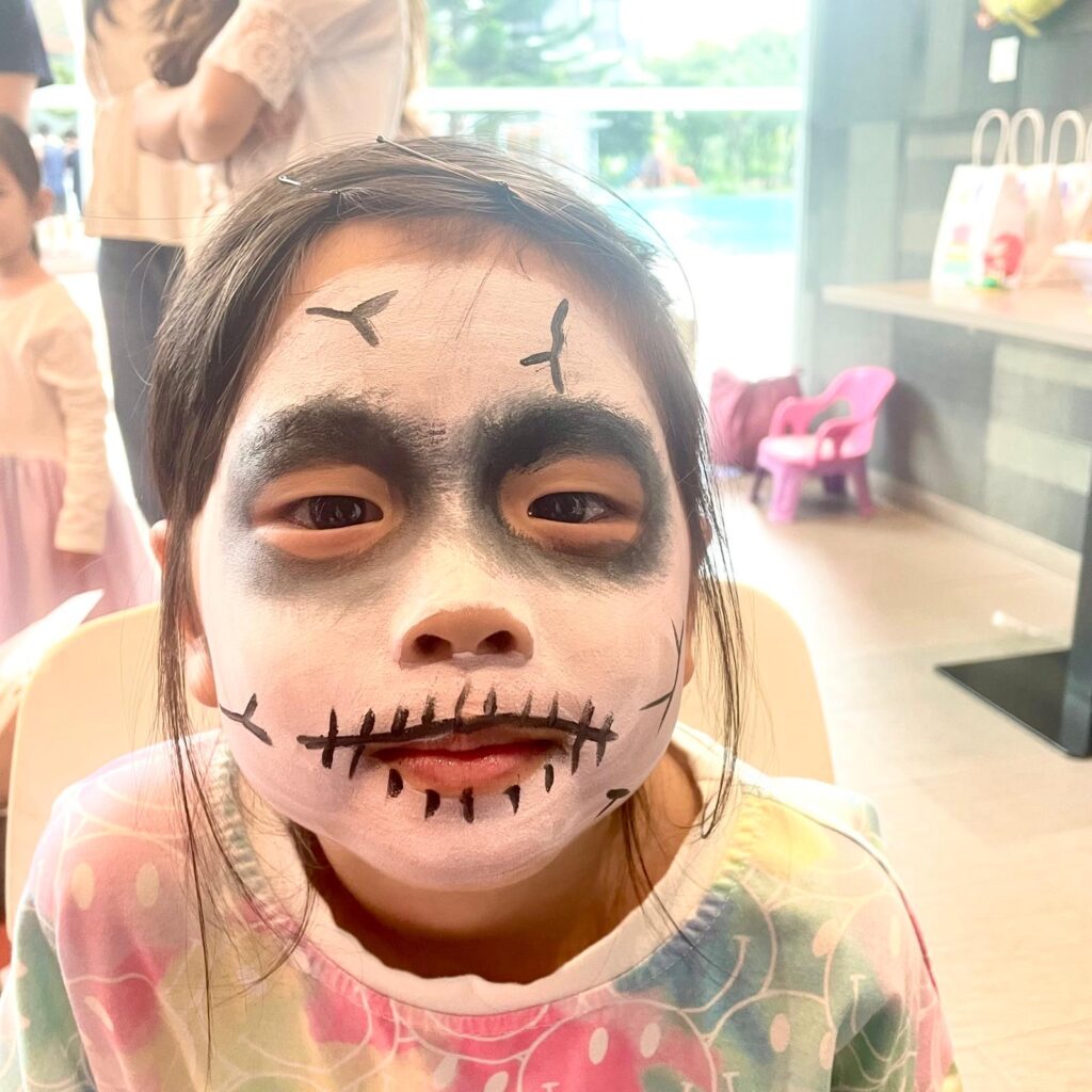 Facepainting for Children's parties by The Kindled Collective - skull design on face - halloween themed