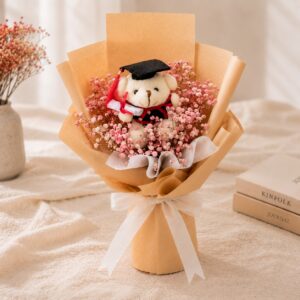 A bundle of dried baby’s breath with a mini graduation bear! Suitable for both guys and girls. Red dried baby's breath wrapped in rustic brown kraft paper with white ribbon. Topped off with a graduation bear in either white or brown!